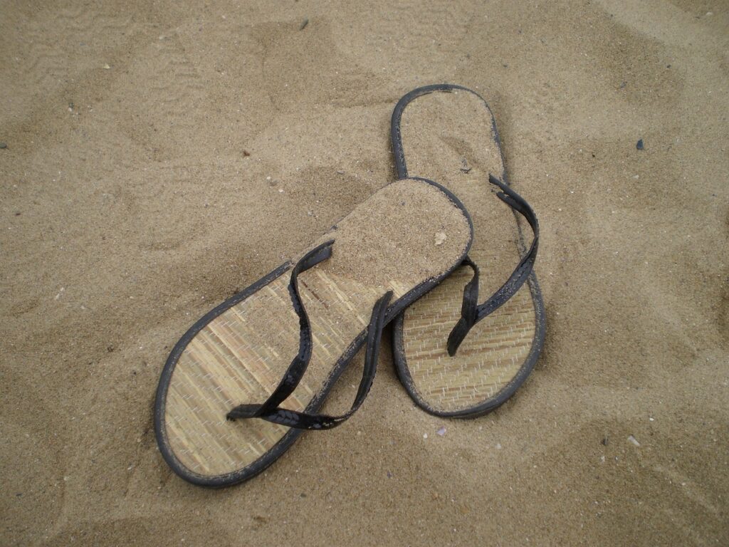 sandals, sand, beach-186437.jpg